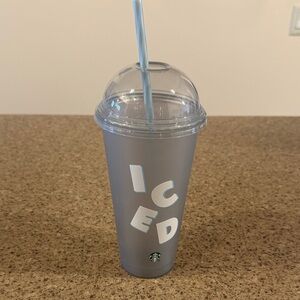 Starbucks Silver Tumbler with White 'ICED' Lettering and Blue-Striped Straw